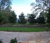 Double Sided Stacked Stone Wall with Landscaping, Arnold